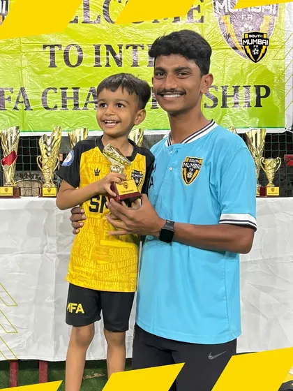 Another proud moment between a young player and his coach. Mentorship starts from the very first day at SMFA.