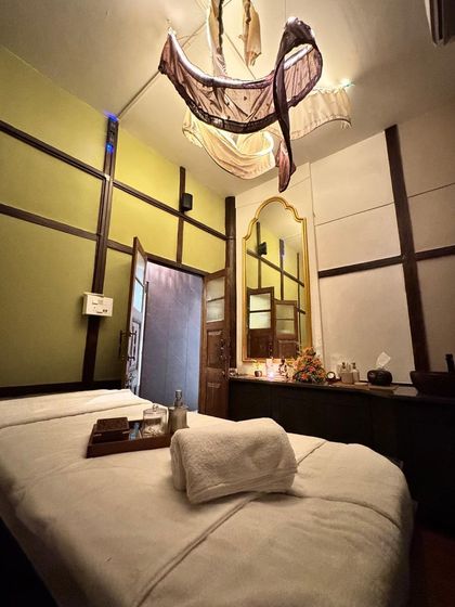 This is one of our uniquely designed treatment rooms at the new IOSIS Luxe Wellness Centre in Guwahati. The decor blends modern comfort with traditional elements, creating a warm and inviting atmosphere for your spa experience.