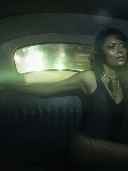 A scene from a fashion editorial inside my classic VW Beetle. This image demonstrates our signature style of using unconventional spaces and moody, cinematic lighting to create a story that feels like a still from a movie.