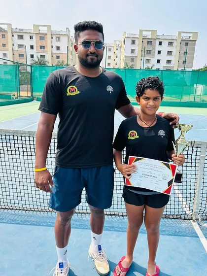 Building champions from a young age. One of our rising stars celebrates her National Series U/12 singles and doubles titles, a result of our structured development program for junior players.