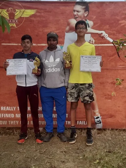 Riddhiman Ojha and his doubles partner after securing another title at the AITA CS7 event in Rohtak.
