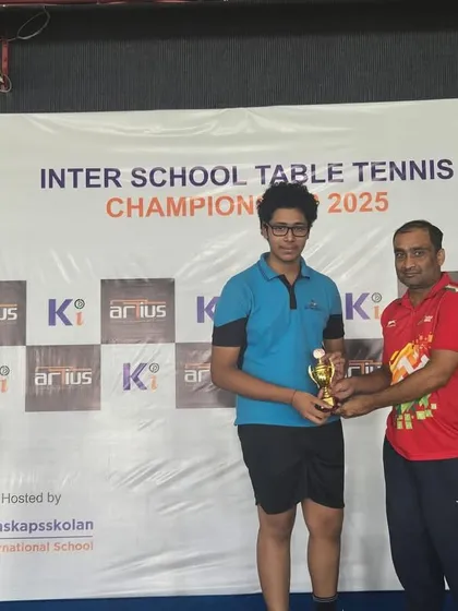 Presenting the trophy for 3rd place to Pratyush Pande in the Under 17 category at the Inter-School Table Tennis Championship. Every win is a step forward.