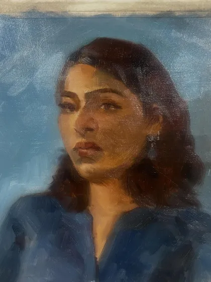 A detailed close-up of the final portrait of Mirra. I focused on capturing the light on her face and her gentle expression.