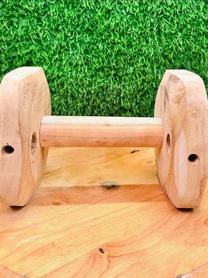 For obedience and sport training, a good dumbbell is essential. I craft these wooden training dumbbells for retrieval work. This one weighs about 850 grams, which is a standard weight for many sport competitions, and is built to last through countless sessions.