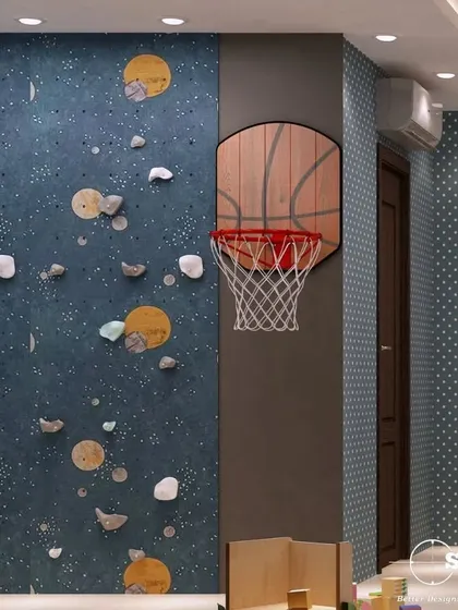A fun and functional kid's room with a rock-climbing wall and a basketball hoop. We believe in creating spaces that encourage play and reflect a child's personality.