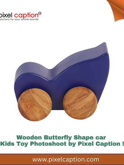 A branded image of a wooden butterfly-shaped toy car. Our graphics are designed to be bright and cheerful to attract the target audience.