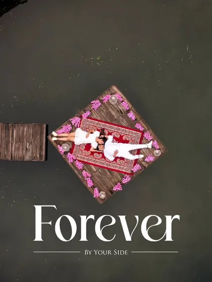 I use drone photography to capture breathtaking, cinematic perspectives that add a grand scale to your love story. This aerial shot shows the couple in their own peaceful world, a beautiful symbol of their journey together.