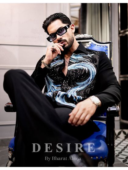 Command attention without saying a word. The bold pattern and luxe attitude of this shirt are for the man who is unapologetically himself.