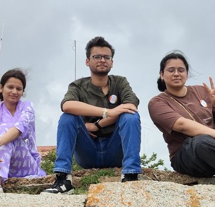 Taking a relaxing break and enjoying the view during our Adiyogi-Lepakshi trip. It's not just about the destination, but the moments in between.