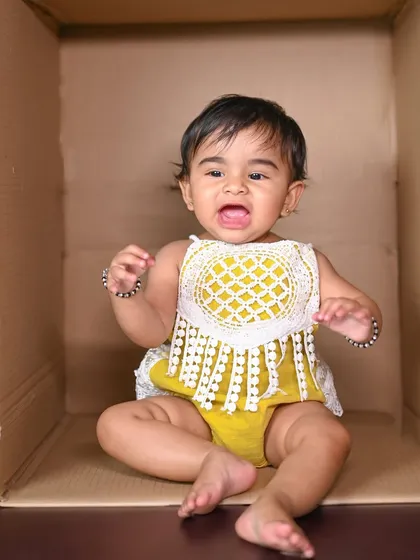 Another expressive moment from the 'baby in a box' series. These simple shoots really let the baby's personality shine.