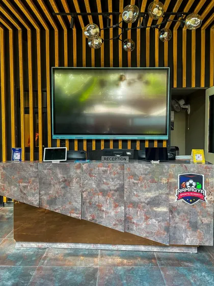 The modern and stylish reception area at our Ramagya Sports Academy location, where your wellness journey begins.