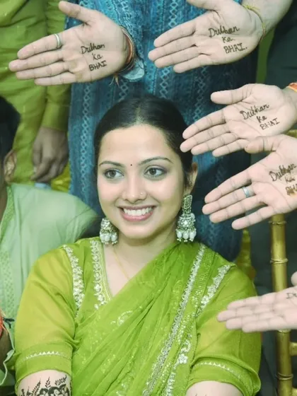 It's the small, creative details that make memories special. During this Mehendi ceremony, the bride's brothers showed their love with 'Dulhan ka Bhai' written on their hands, and I made sure to capture this unique and fun group portrait.