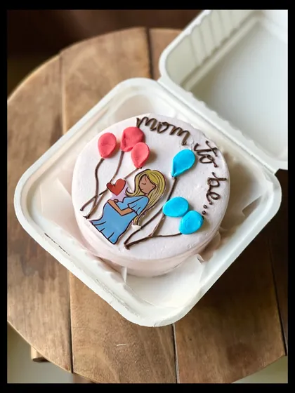 A sweet cake for a mom-to-be, featuring a lovely illustration of an expecting mother holding her belly, surrounded by pink and blue balloons. It's perfect for a baby shower or gender reveal.