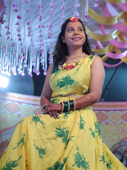 Another happy moment from the haldi ceremony, the bride looks absolutely radiant.