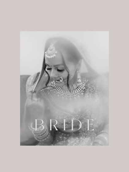 A soft and hazy black and white bridal portrait, giving it a timeless, vintage feel.