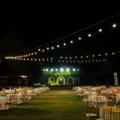 We transformed this open lawn into an enchanting setting for a Sangeet night. With elegant table arrangements, a grand stage, and magical string lighting overhead, we created a warm and inviting atmosphere for an evening of music, dance, and celebration.