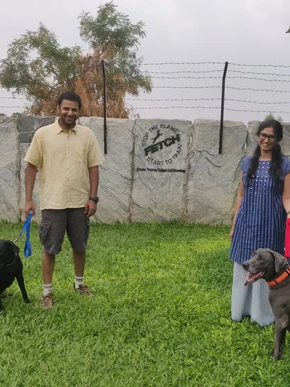 This couple now has the tools to manage their two wonderful dogs, a Labrador and a Weimaraner, after completing our program.