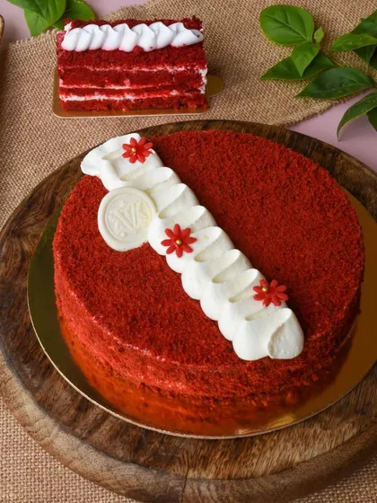 Red Velvet and love go hand in hand. Our classic Red Velvet cake is moist, fluffy, and topped with a generous amount of our signature cream cheese frosting. A slice of this is pure happiness.