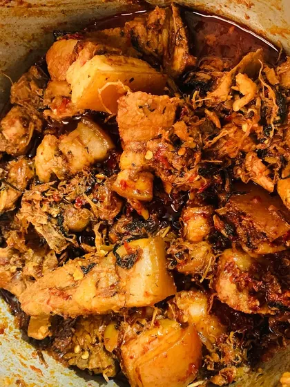 A pot full of the pork with dried bamboo shoot, ready to be packed for orders.