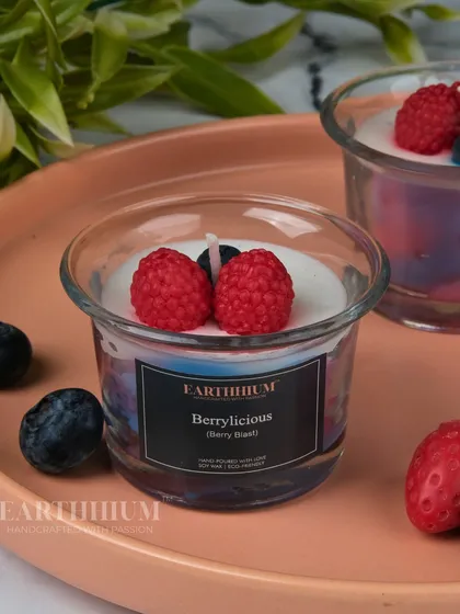 The Berrylicious candle is a mix of blue and red berries, creating a vibrant and fun look.