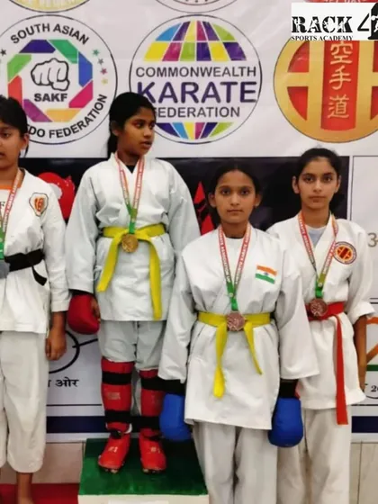 Our female athletes on the winner's podium. We celebrate their strength, skill, and the medals they earned through relentless hard work and training.