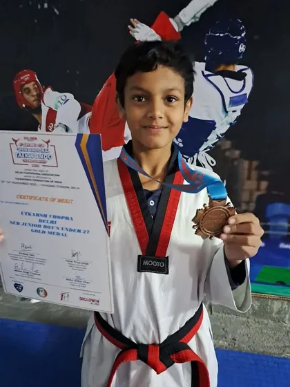 Utkarsh Chopra with his gold medal from the 4th Aryan's Cup Open National Taekwondo Championship.