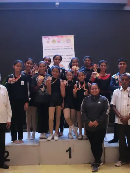 The result of dedication. Our aerobic gymnastics team celebrating their well-deserved wins at the State Championship. We don't just build gymnasts; we build champions.