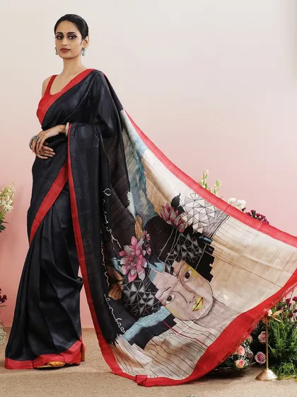 The full view of the abstract face print saree, a bold and artistic statement.