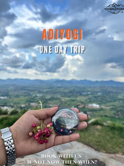 A promotional image for our Adiyogi one-day trip, showcasing our branding and the scenic beauty.