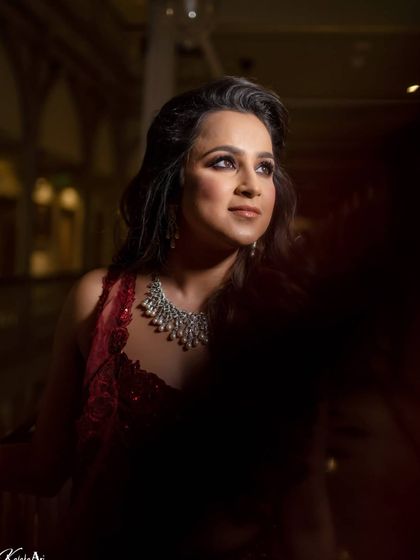 A moody and dramatic portrait of the bride, using shadows to create a cinematic and mysterious look.