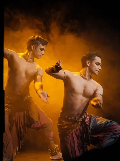A shot from the 'ATAH' premiere, with dramatic, warm lighting and smoke creating a powerful atmosphere for our duet.