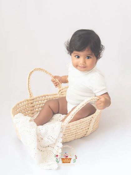 A duplicate of image 36, showing this adorable baby in a simple and natural setup. These minimalist sitter photos are some of my favorites to create.