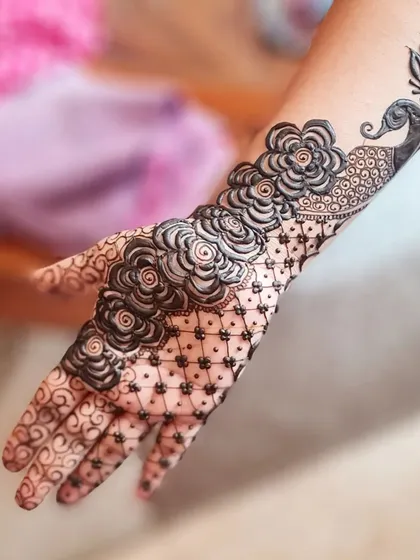 I always wanted to try a bold design like this, with heavy floral elements and a peacock. I was so happy when a client requested it!