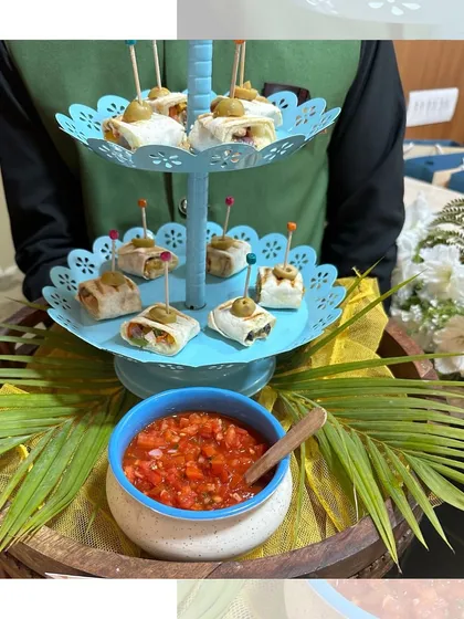 Spicing things up, one bite at a time. Our Fajita Bites are mini tortilla wraps filled with seasoned vegetables, served on a tiered stand with fresh salsa.