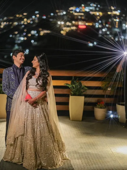 A destination wedding is about more than just a location; it's about a feeling. Here, against the sparkling city lights of the hills, I captured a quiet moment of togetherness that feels as vast and beautiful as the view.