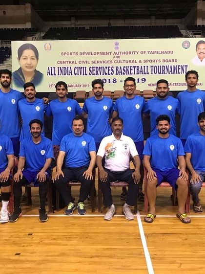 A formal team photograph of the Central Civil Services team at the All India Civil Services Basketball Tournament 2018-19 in Chennai. This event showcases top talent from across the country's civil services.