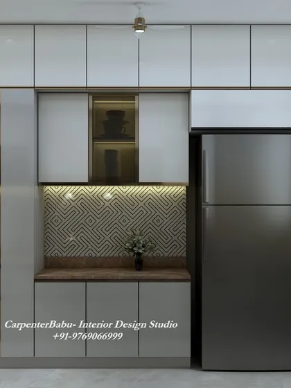 This view shows the tall unit for the refrigerator and oven, demonstrating how I plan for all modern appliances in my kitchen designs.