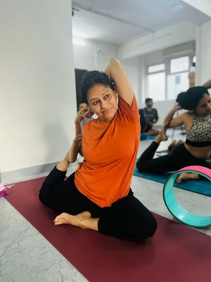 A beautiful demonstration of Mermaid Pose, showcasing the deep backbend and hip-opening benefits of this advanced asana.