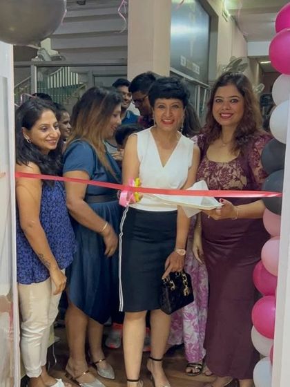 Another angle of the ribbon-cutting. It's a moment of pride and joy for the entire DtF family.