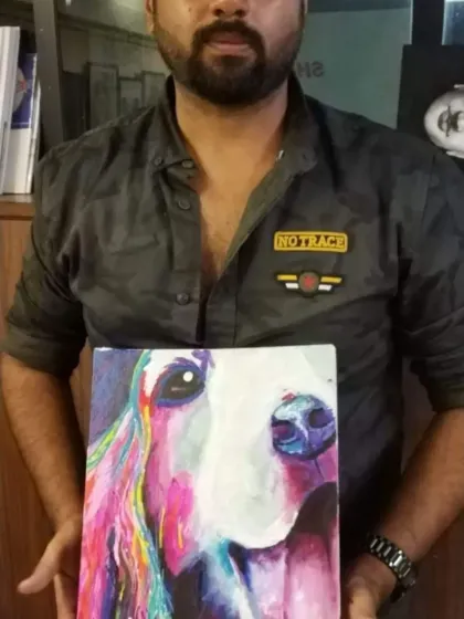 This student is proudly holding his vibrant and expressive painting of a dog. Using bold colors and strokes, he truly captured a joyful spirit on the canvas. It’s wonderful to see students find their unique style.