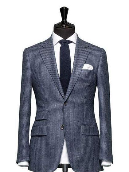 This pinstripe single breasted blazer is a timeless piece of formal wear. I ensure the structure is perfect, giving you a sharp and professional silhouette.