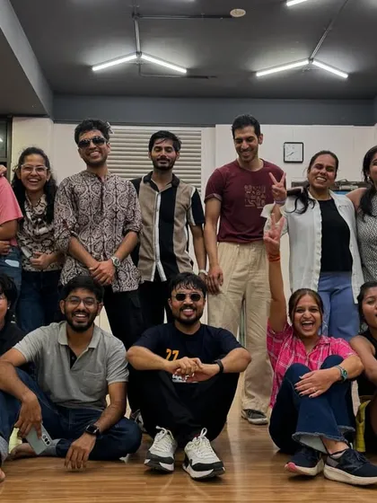 A candid group shot full of laughter and good vibes after a tiring but fulfilling session.