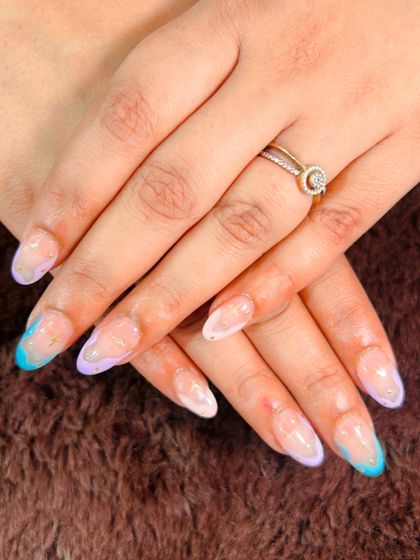 A dreamy, abstract design with pastel blue and purple watercolor-style tips.