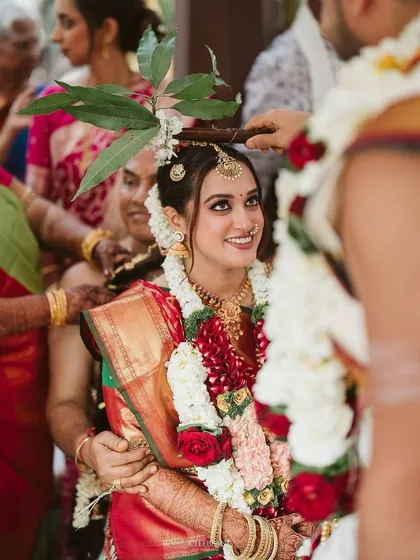 The most beautiful moments are the candid ones. Here, the bride's natural, dewy makeup shines through during a sacred ceremony, reflecting her inner happiness and glow. My job is to make sure you look and feel beautiful, without worrying about your makeup.