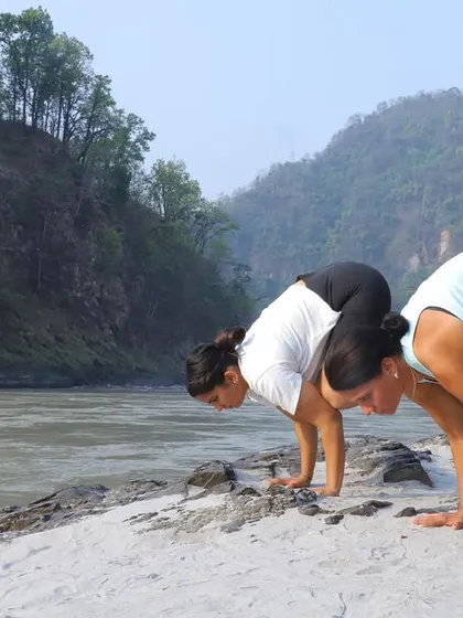 Getting ready for another yoga retreat. Here we are practicing Bakasana, or crow pose, by the river in Rishikesh.