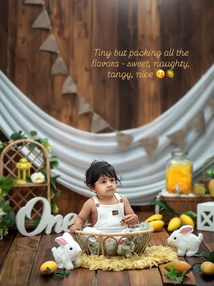 So many flavors in one tiny person! This wide shot shows the full mango and bunny farm setup we created for this unique first birthday theme.