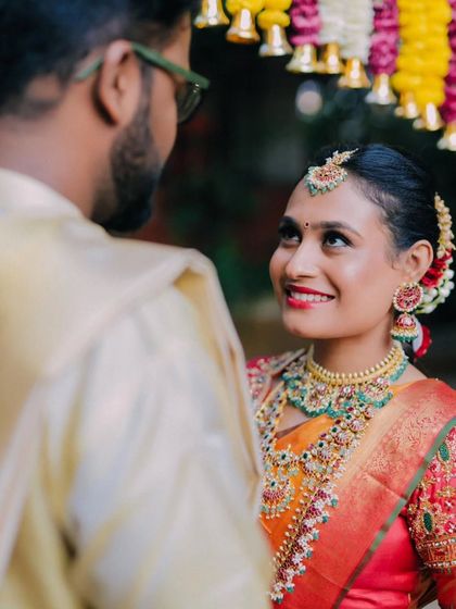 The bride's joyful expression as she looks at her groom. Capturing these glances is what makes wedding photography so special.
