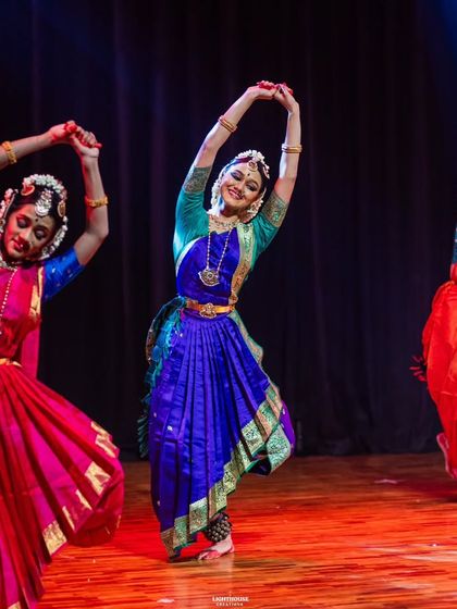 Three dancers in perfect harmony, their movements flowing together as one. This is a testament to their teamwork and countless hours of rehearsal for Margam.