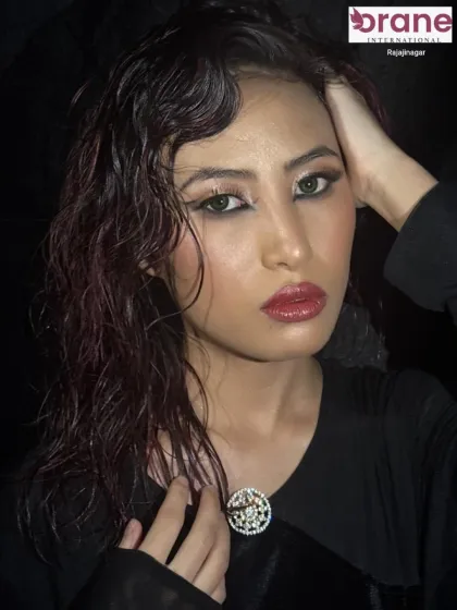 A high-fashion glossy makeup and wet hair look. Our advanced courses push creative boundaries, teaching editorial and runway-inspired styles.