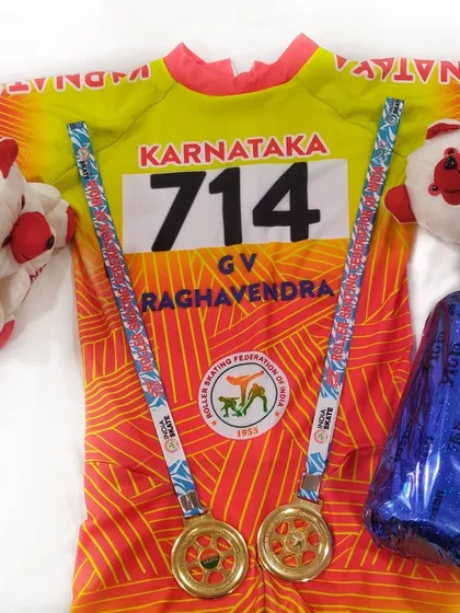My race kit and two gold medals from a national championship. The gear of a champion.
